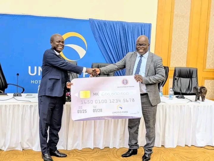 UMODZI HOLDINGS HANDS OVER K600 MILLION DIVIDEND TO MALAWI GOVERNMENT